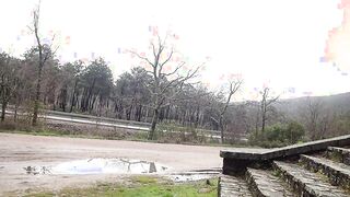 naked walk on a rainy day by the roadside